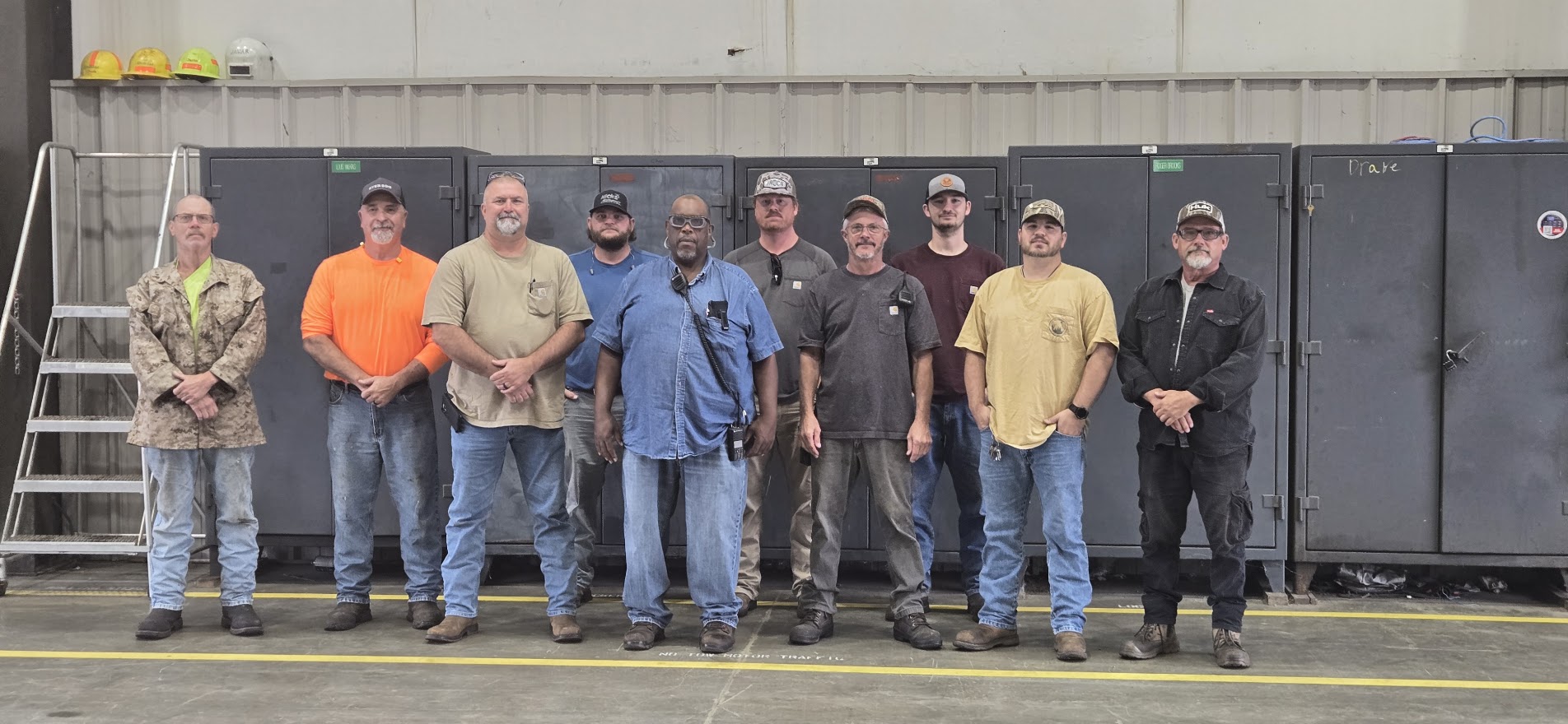 A group at Plymouth Mill celebrate the woodyard's safety milestone.