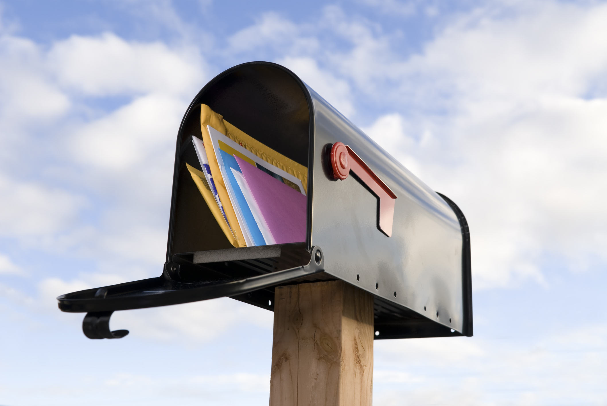 open mailbox full of letters